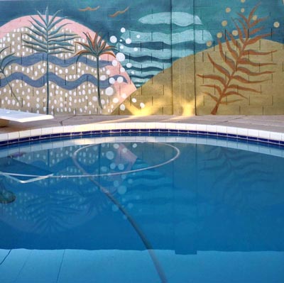 block wall poolside backyard mural